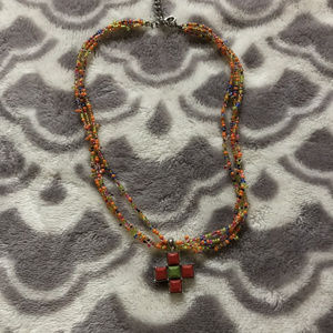 Multi colored beaded necklace with cross